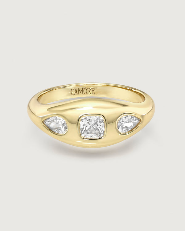 product photo of a gold ring with 3 mixed cut stones in a gypsy setting