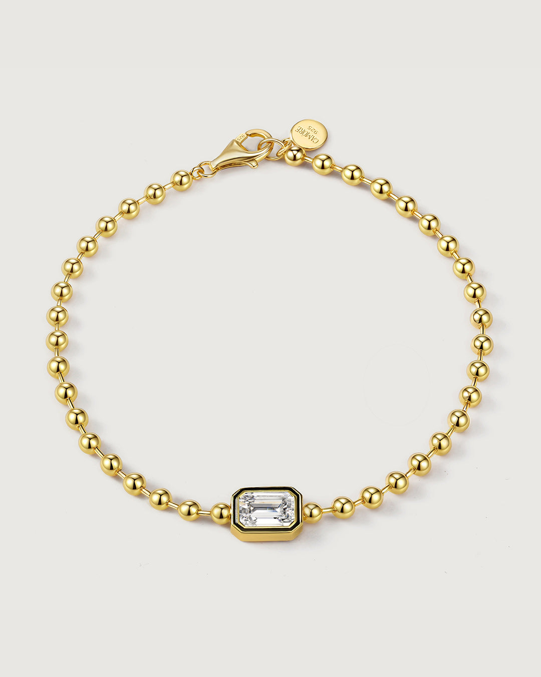 product shot of the gold emerald-cut beaded bracelet by Camóre