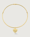 product photo of a gold choker with a heart shaped charm by Camóre