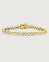 Camóre Axis Bracelet product photo, a gold bezel-set tennis bracelet