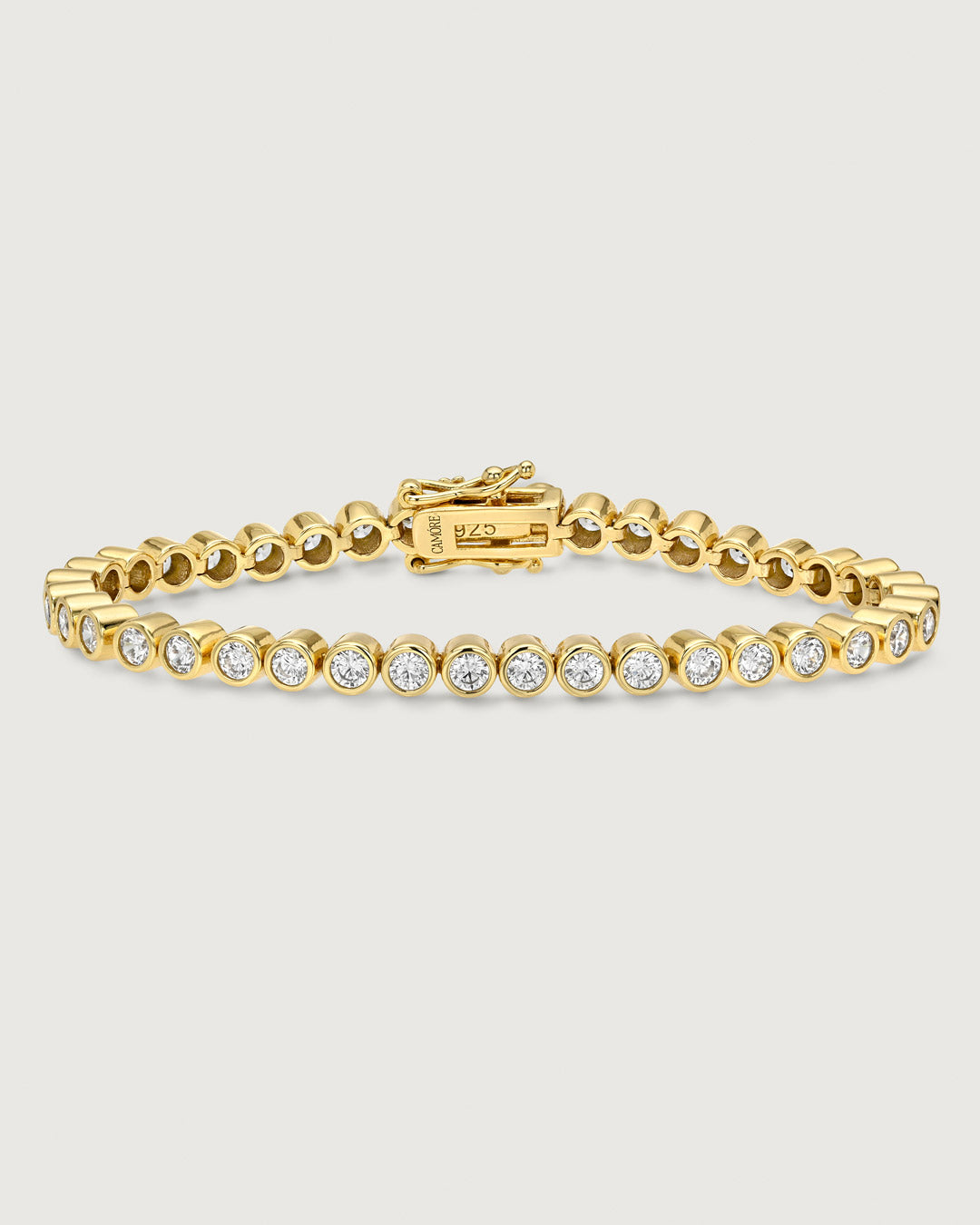Camóre Axis Bracelet product photo, a gold bezel-set tennis bracelet
