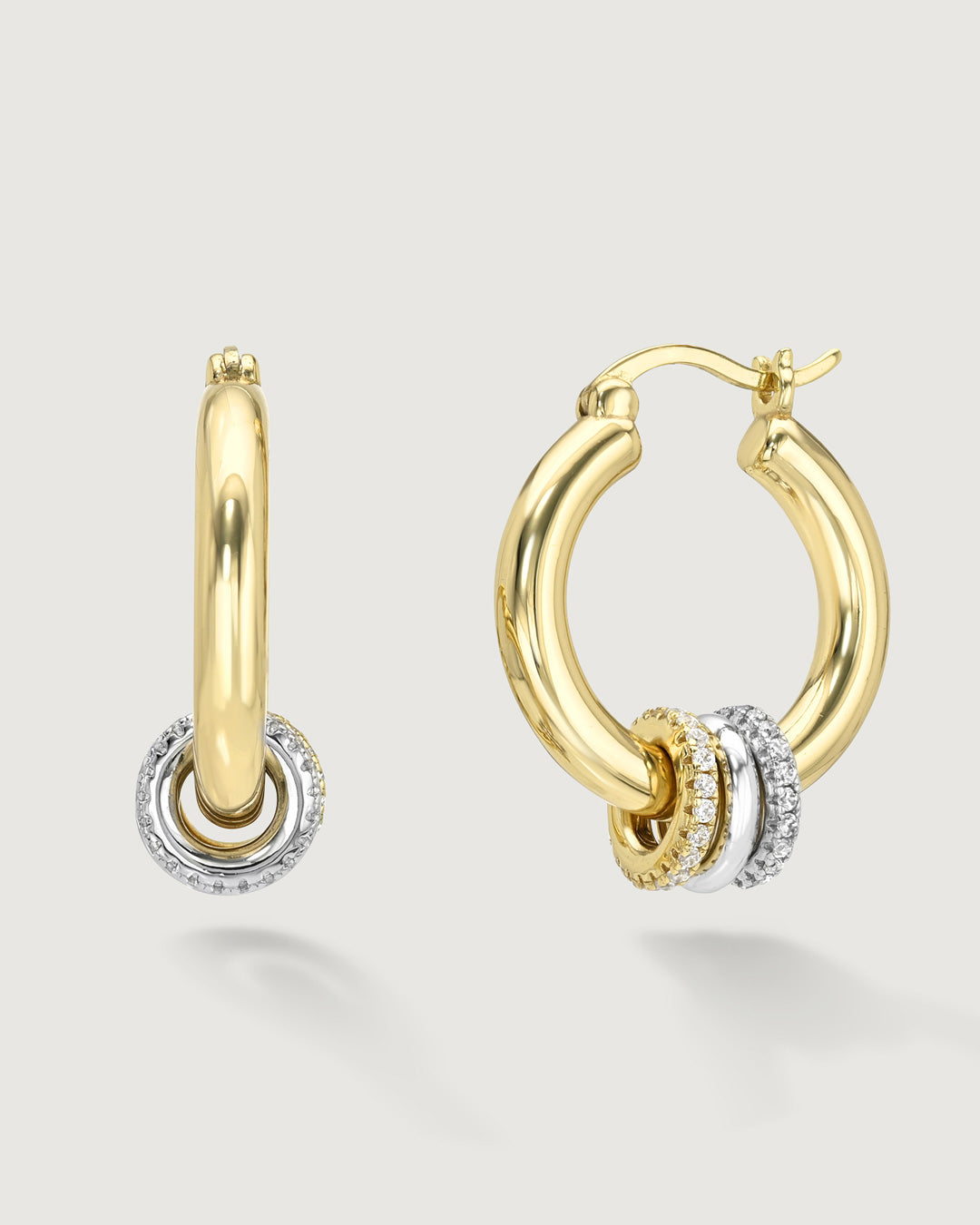 product photo of the mixed metal hoop earrings by Camóre, featuring removable charms