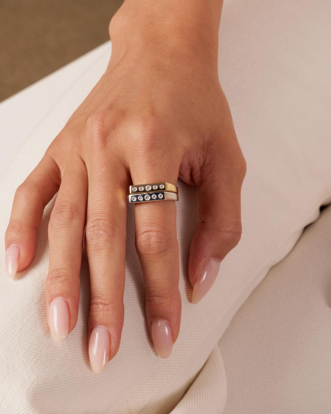 model wearing the mixed metal stacking ring set by Camóre