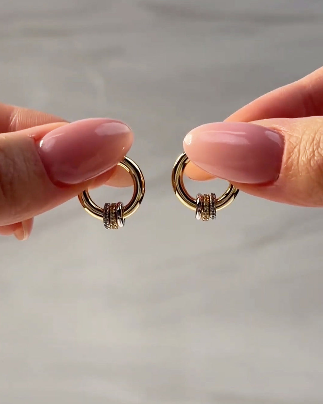 video of the mini mixed metal hoop earrings by Camóre