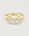 product photo of a gold ring with 3 mixed cut stones in a gypsy setting